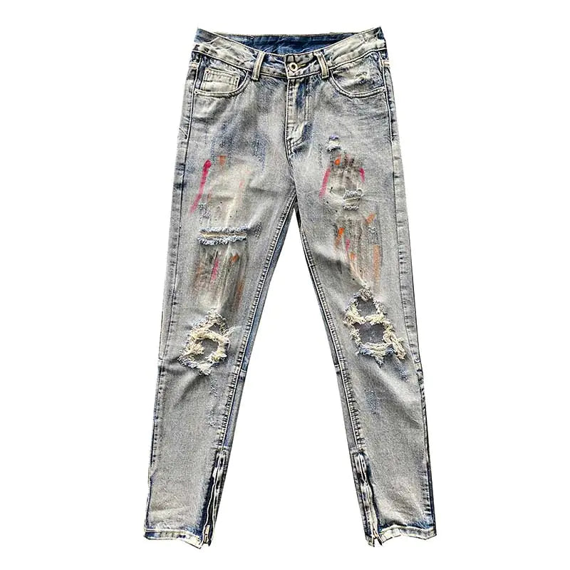 Jeans Desgastados con Salpicaduras de Pintura y Puños con Cremallera