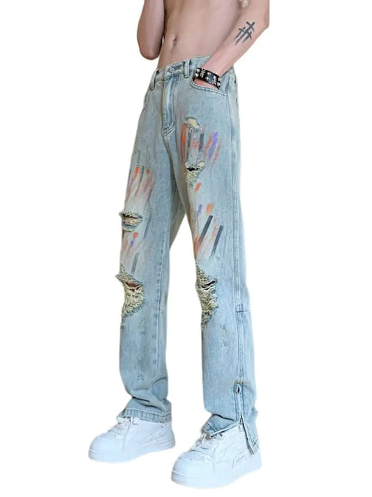 Jeans Desgastados con Salpicaduras de Pintura y Puños con Cremallera